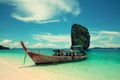 Boat near the sandy beach.