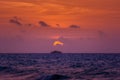 Boat on the ocean at sunset or sunrise Royalty Free Stock Photo