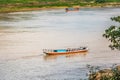 Boat offshore Nam Khan river, Luang Prabang, Laos. Copy space for text. Royalty Free Stock Photo