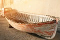 Boat old broken, standing on the pier.