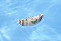 A boat made of paper money Royalty Free Stock Photo