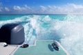 Boat outboard stern with prop wash caribbean foam Royalty Free Stock Photo