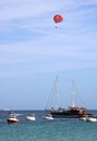 Boat parasailing over Mellieha Bay, Malta Royalty Free Stock Photo