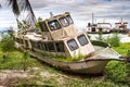 A boat parked next to a body of water Royalty Free Stock Photo