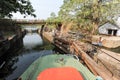 Boat passing a barrage on the way from Kollam to Alleppey