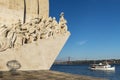 Boat passing by the Monument of the Discoveries Padrao dos Descobrimentos in the Tagus River in Lisbon, Portugal, the the 25 of
