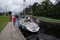 Yacht passing through Neptunes Staircase, Fort William, Scotland Royalty Free Stock Photo