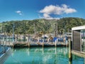 Boat peer with a fishing vessel at Picton, New Zealand in the afternoon