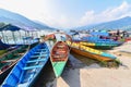 Boat Pier with Colourful Tourist Boats on Phewa Lake Royalty Free Stock Photo