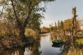 Boat at the pier on the lake quiet place outside the city trees around the river