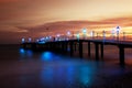 Boat pier at sunset. Royalty Free Stock Photo