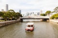 Boat Approaching Anderson Bridge on Singapore River Royalty Free Stock Photo