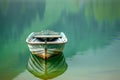 Boat in a quiet cove of a green lake