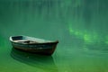 Boat in a quiet cove of a green lake