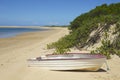 Boat on a quiet lake in Portuguese island, Mozambique Royalty Free Stock Photo