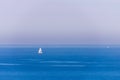 Boat racing across open ocean water. Boat speeding in the sea. Minimal nature photography. Beach view of maritime transportation. Royalty Free Stock Photo