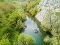 Boat rafting on river. Aerial view from a drone in Nera's Gorges Royalty Free Stock Photo