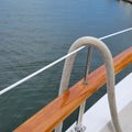 Boat railing and mooring rope closeup