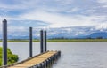 A boat ramp and floating jetty on a river or lake. Wooden pier on a water Royalty Free Stock Photo