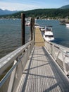 Boat ramp and pier with the boats, Rocky Point Park, Port Moody. Royalty Free Stock Photo