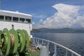 Boat reels with forecastle in background on a ferry in Indonesia. Electrically powered mechanisms for lowering the anchor. Royalty Free Stock Photo