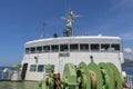 Boat reels with forecastle in background on a ferry in Indonesia. Electrically powered mechanisms for lowering the anchor. Royalty Free Stock Photo