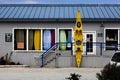 Boat Rental Shop With Yellow Kayak Outside Door