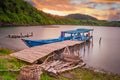 A boat rests on the lake pier. West Sumatra, Indonesia Royalty Free Stock Photo