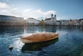 Boat at Reuss River and Luzern Skyline with Jesuit Church - Lucerne, Switzerland Royalty Free Stock Photo