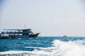 Boat ride and ships in island ocean sea background