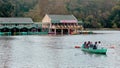 Boat riding a family at the kodaikanal lake near the boat house.