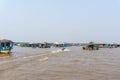 Boat riding in the floating village in tonle sap lake, in Cambodia Royalty Free Stock Photo