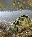 Boat and river in the autumn