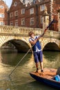 Boat on the river Cam and Bridge of Sighs in Cambridge, University of Cambridge, UK Royalty Free Stock Photo