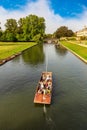 Boat on the river Cam and Clare Bridge in Cambridge, University of Cambridge, UK Royalty Free Stock Photo