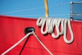 Boat rope at colorful moored fishing vessel Royalty Free Stock Photo