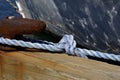 Boat rope tied to dock cleat in Newport Marina Royalty Free Stock Photo