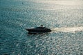 Boat sail on silver sea water waves in Miami, USA