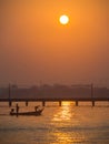 The Boat Sailed Through The Sea Next to The Bridge