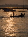 The Boat Sailed Through The Sea Next to The Bridge