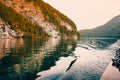 Boat sailing through crystal clear waters of Koenigsee lake Royalty Free Stock Photo