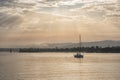 Boat sailing at dawn along the Lima river