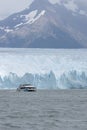 Boat sailing near the Perito Moreno glacier, in Patagonia, Argentina. Royalty Free Stock Photo