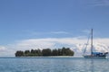 A boat sailing nearby Dodola island of Pulau Morotai regency, North Maluku, Indonesia Royalty Free Stock Photo