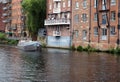 A boat sailing past calls laning in the river aire in leeds west yorkshire Royalty Free Stock Photo