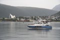 boat sailing in the port of Tromso, northern Norway