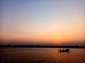 Boat sailing in river ganga sunset view Royalty Free Stock Photo