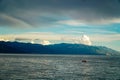 A boat sailing into the sea after the rain