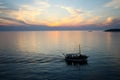 Boat sailing at sunset Royalty Free Stock Photo