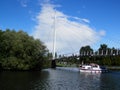 Boat sailing under Caversham to Reading Foot and cycle bridge